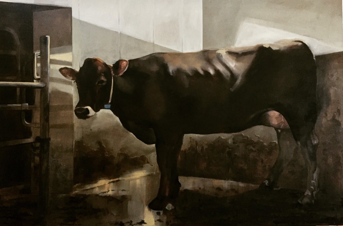 Anouk at the milking robot by Philine van der Vegte 