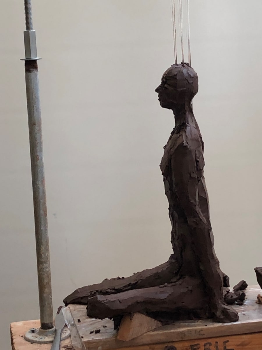 Jesse sitting by Eric Saint Georges 