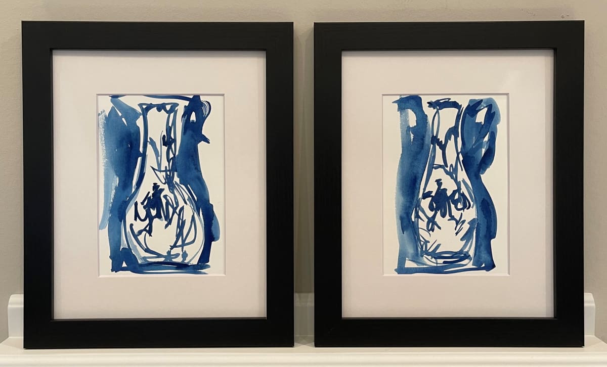 "Time stands still" by JJ Hogan  Image: Pair of abstract Chinoiserie-inspired blue and white watercolors; black gallery frames, matted under glass.