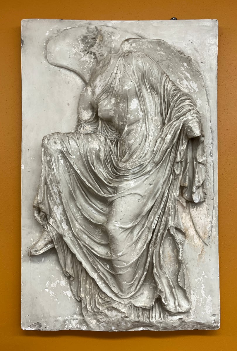 Nike (Victory) adjusting her sandal, Image 1.
