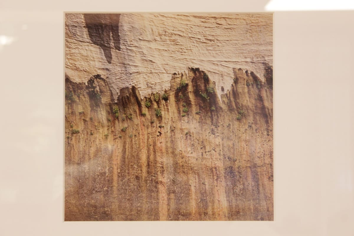 Untitled (Water erosion on cliffside) by Robert James Kelly 