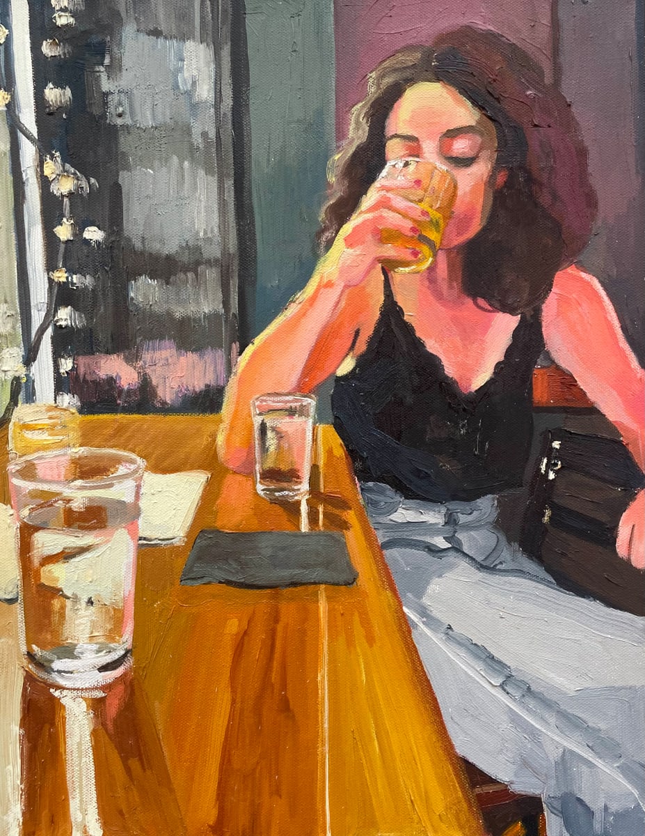 Late Night Beverages by Lauren Karjala  Image: This is another study of night time light through different light sources - the warm light of the bar, the street lights coming in through the window and the string lights reflecting off of the glossy surfaces and coming through the glass. 