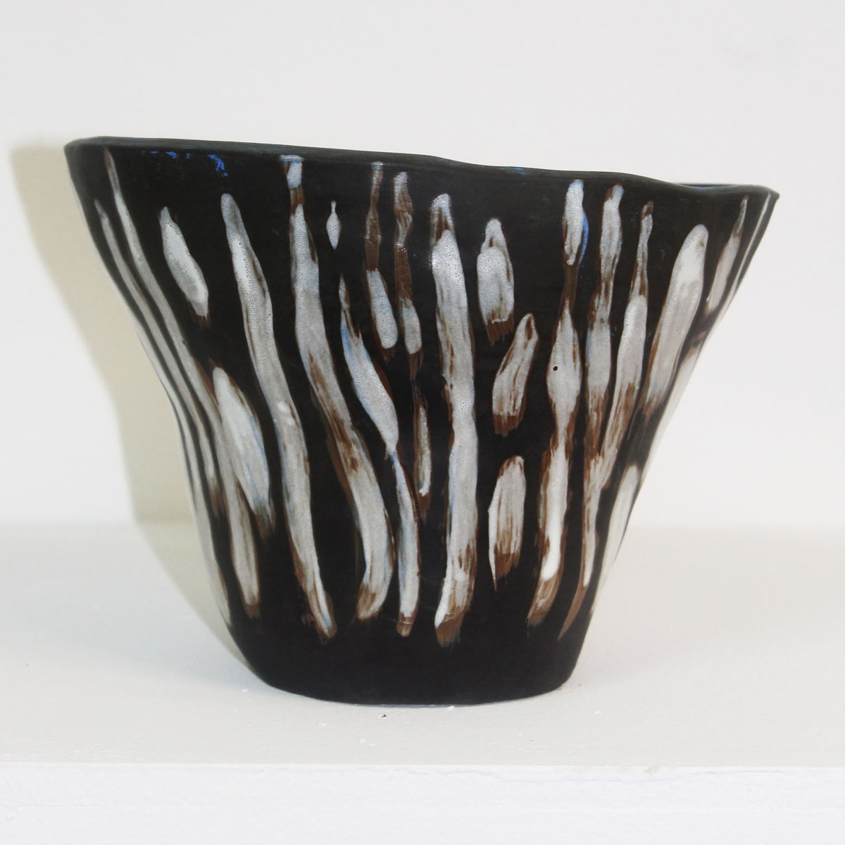 BLACK CLAM POT by Linda Leftwich  Image: Based on the Giant Clams' interior markings