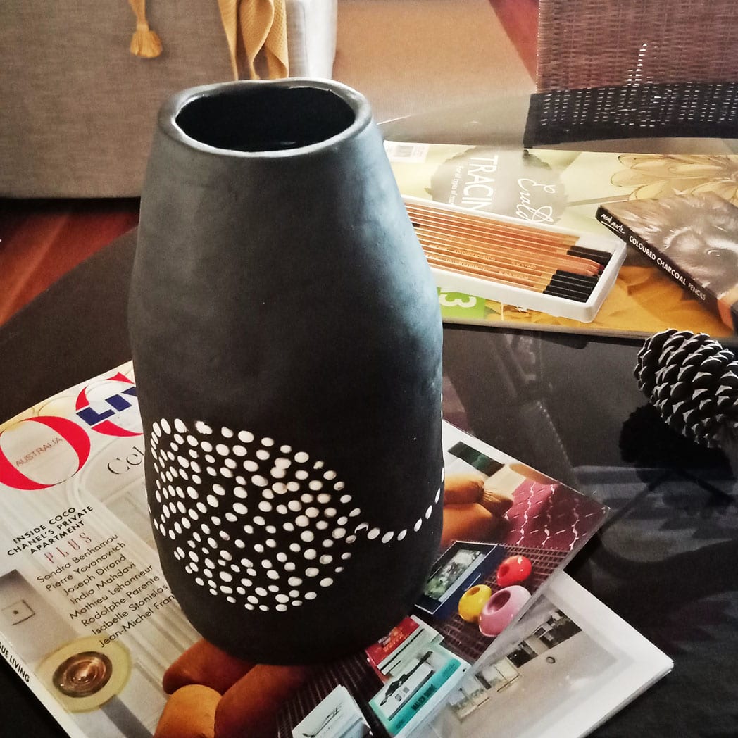 BLACK CLAY VASE WITH CIRCLES by Linda Leftwich  Image: Natural black clay with circles
