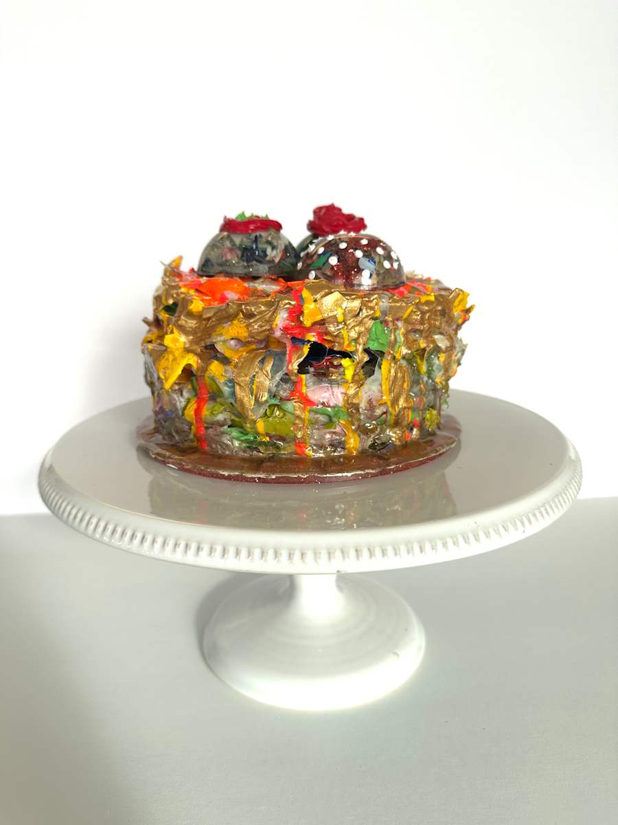 Three Chocolates on a Cake by Shiri Phillips, Image 1.