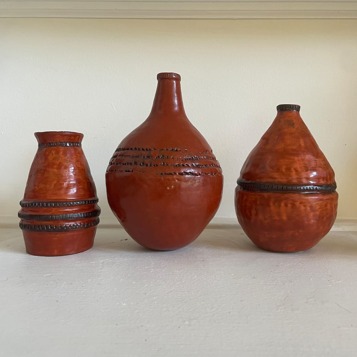 3 Red Vases by Nell Eakin 