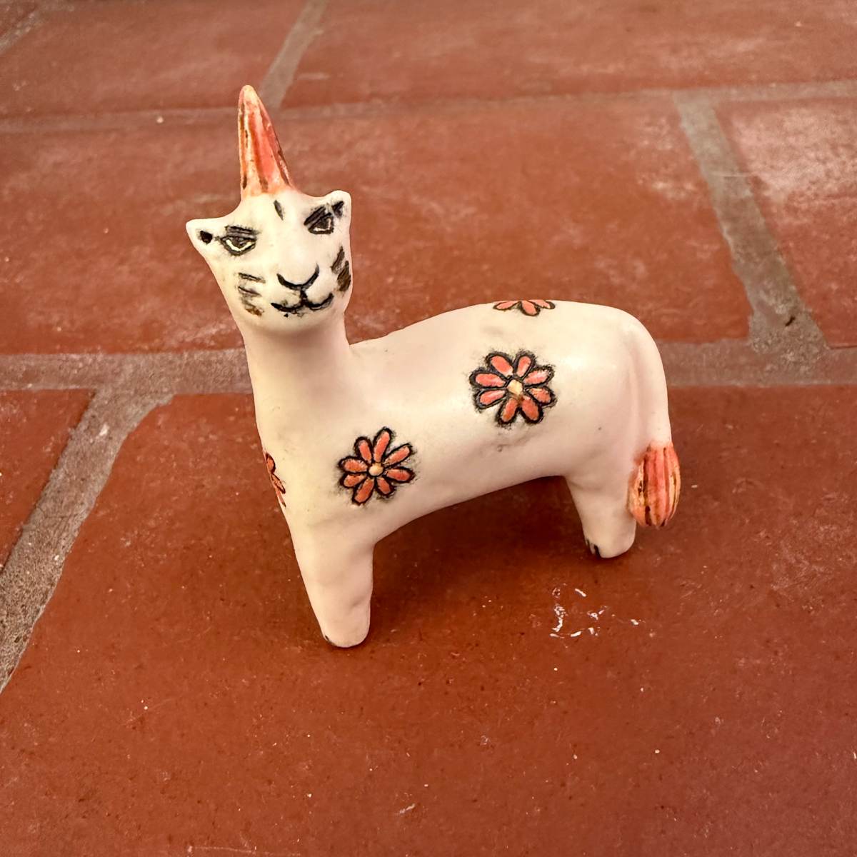 Red Daisy Cat Cream Supreme, a teenie by Nell Eakin 