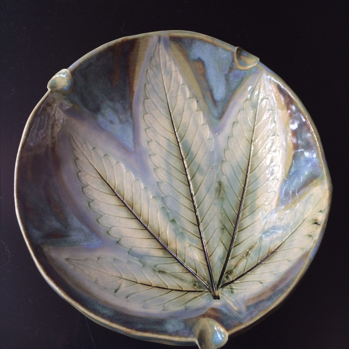 Light and lovely 420 leaf impression ash tray by Nell Eakin 