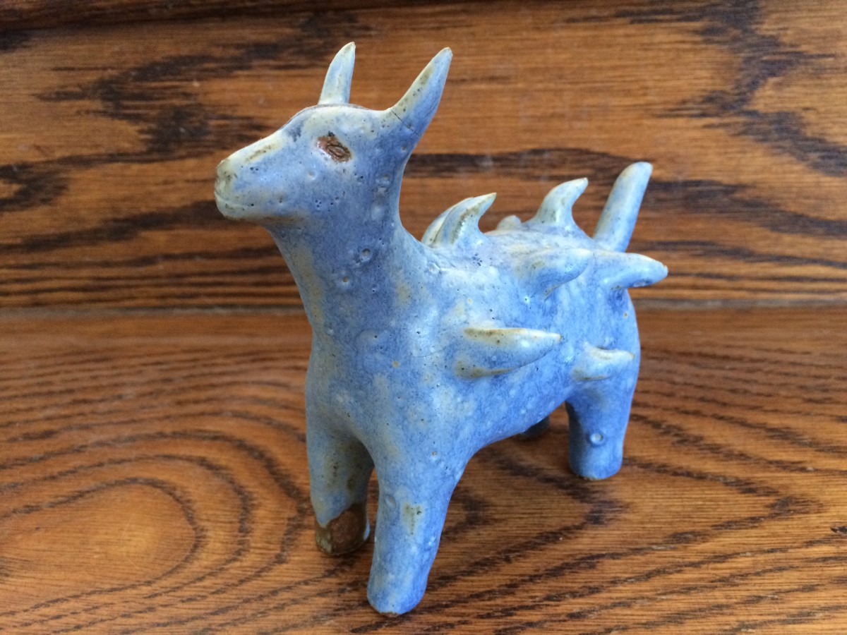 Spike the blue tufted dog by Nell Eakin 