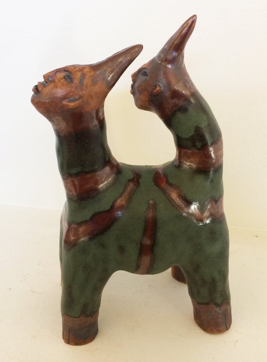 Coco  &  Bunny, a  green striped 2 headed unicorn by Nell Eakin 