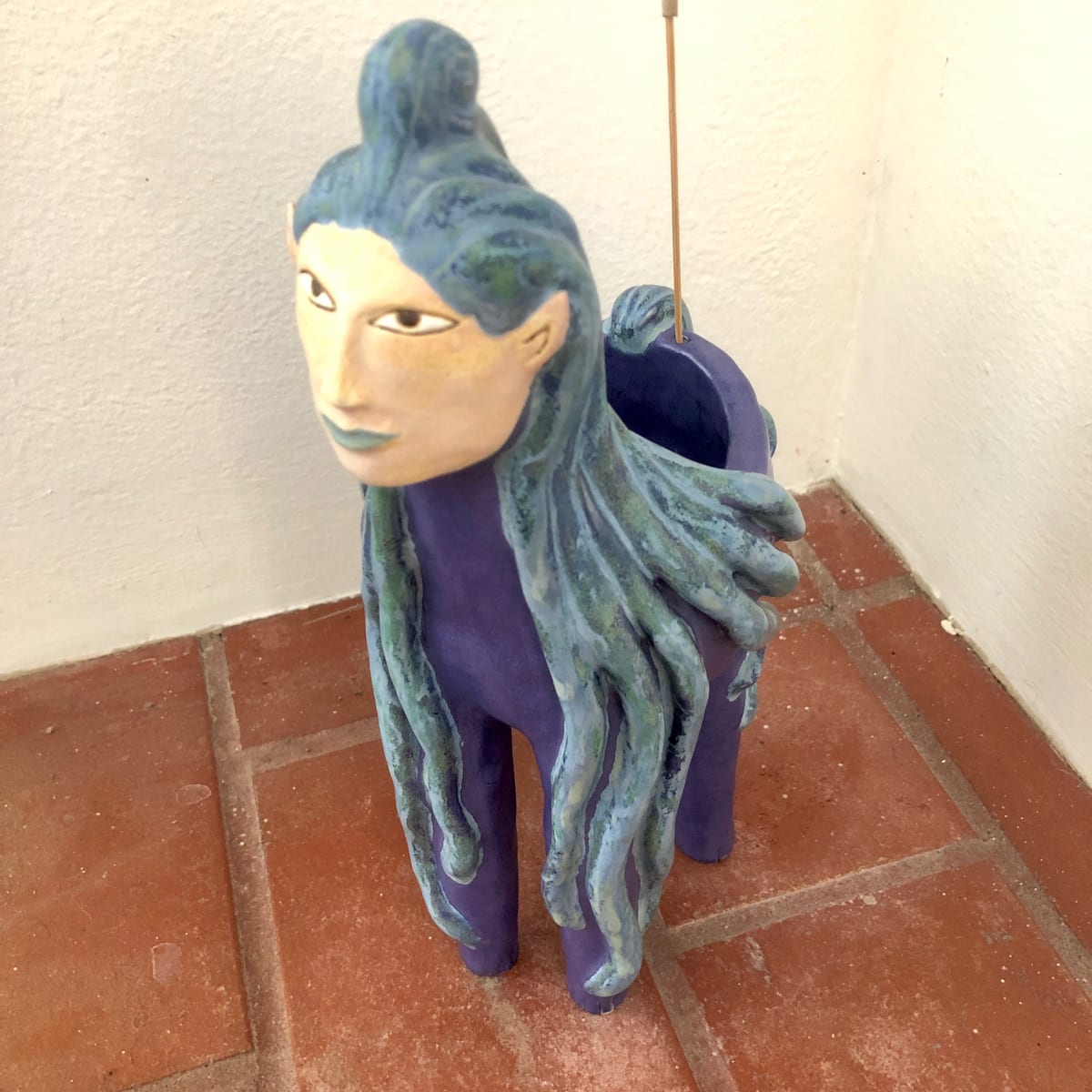 Kalyx Swirl, a dreamy blue haired Incense Holder 