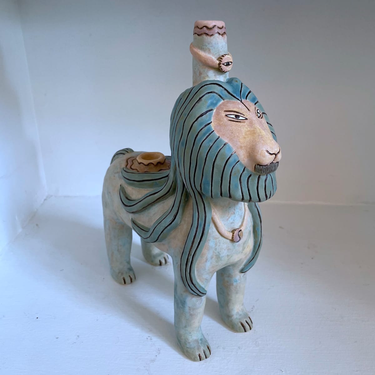 Thaddeus, a meditative lion pipe by Nell Eakin 