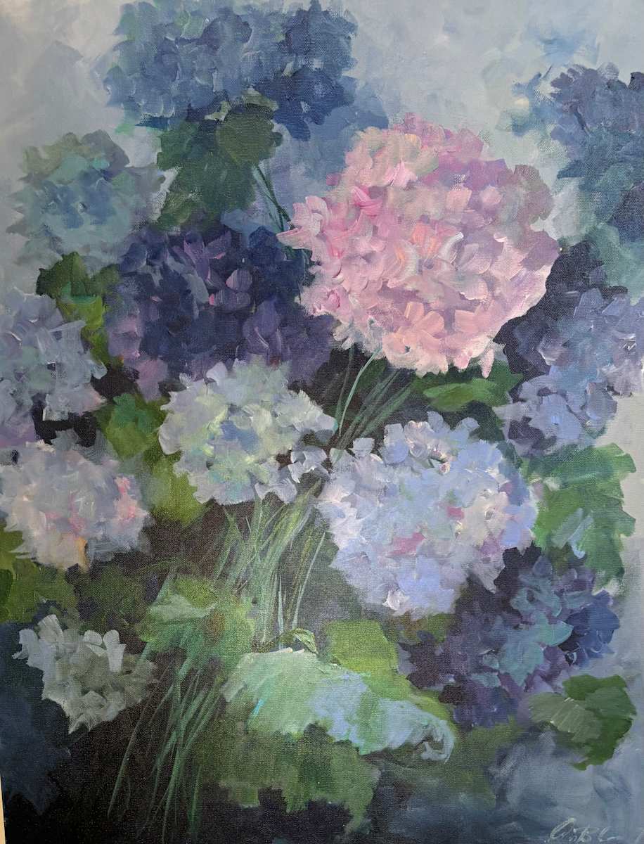Garden Hydrangeas by Amy B. Carroll  Image: Bursting with the lush blues, purples, and soft greens of summer, Garden Hydrangeas captures the quiet beauty of these timeless blooms at their peak. Each petal is painted with delicate layers of color and light, evoking the feeling of a warm afternoon stroll through a flourishing garden.