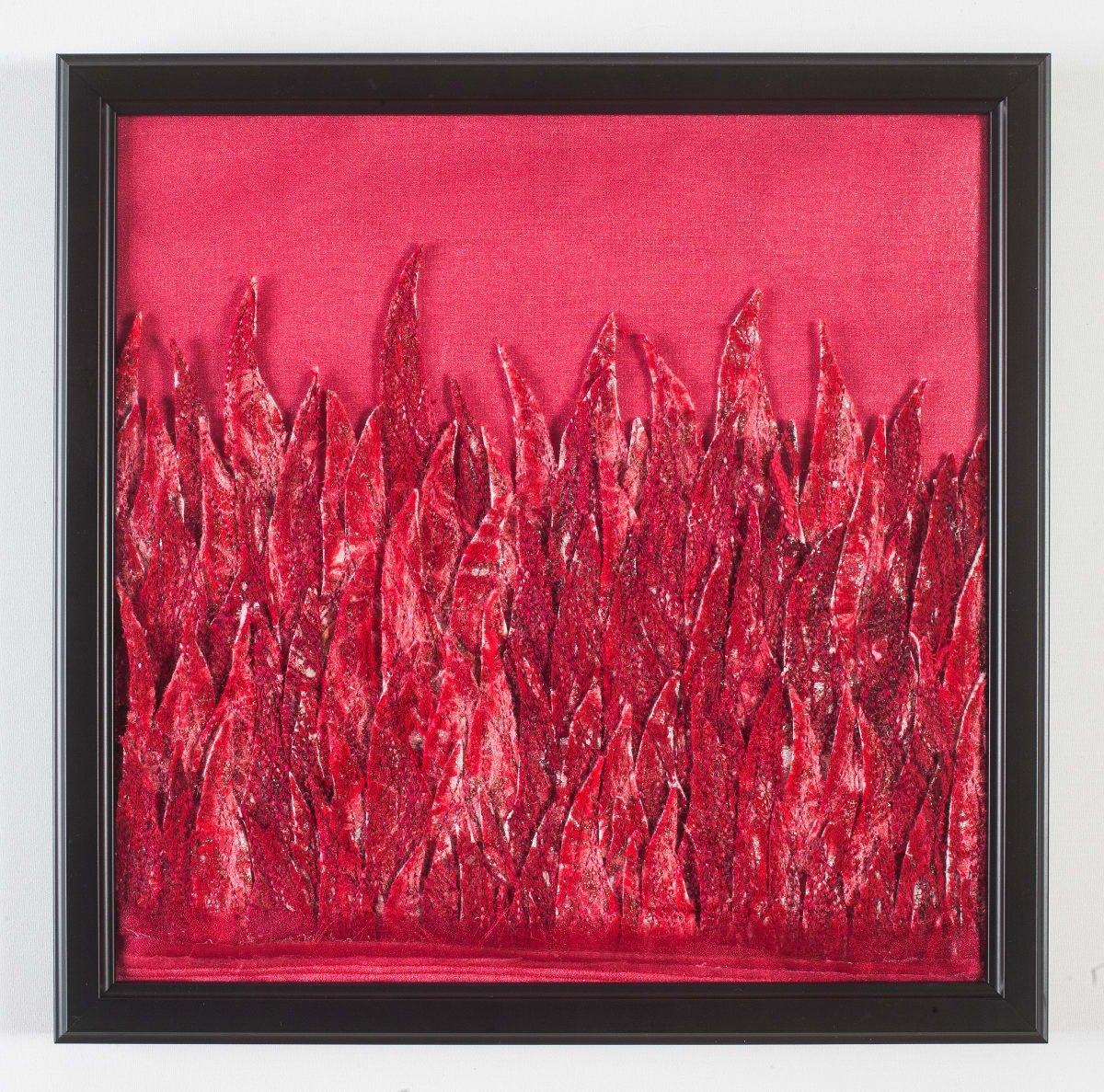 Synesthesia #19 Red by Lesley Turner  Image: Lesley Turner, 'Synesthesia #19 Red', 2017, 13"x13"x0.5". Nylon, acrylic felt and polyester fabric, polyester thread, acrylic paint, oil stick. Working monochromatically I focused on expressing the color’s radiating energy through line and value.  Photo: Tony Bounsall Photo-Design