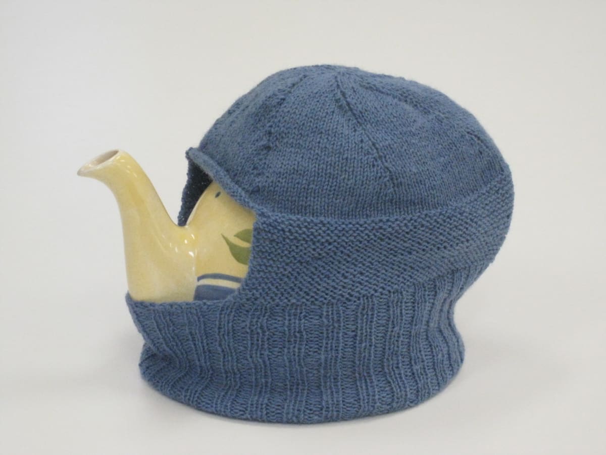 Keeps You Warm At Night by Lesley Turner  Image: Lesley Turner, 'Keeps You Warm At Night', 2018, 8"h x 11"w x 6.5"d. Hand-knit wool, ceramic. Florence's knitted tea cozy acted as a trauma trigger by reminding her of her three sons in the air force. 
