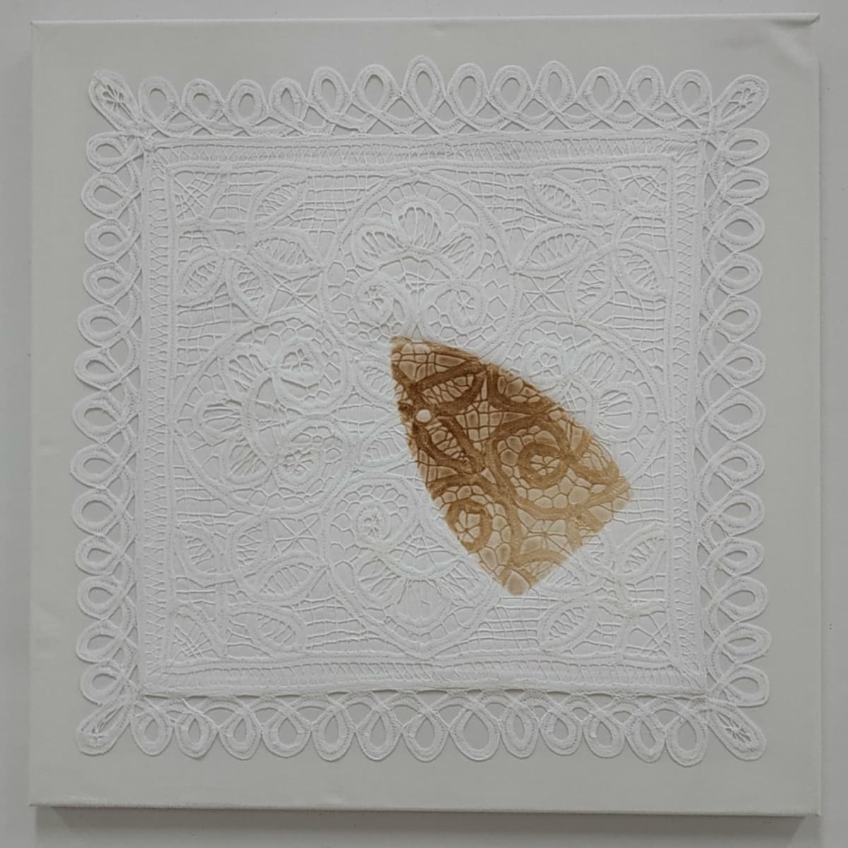 Scorch: Distracted by Lesley Turner  Image: Lesley Turner, 'Scorch: Distracted', 2020, 22"x22". Cotton pillow case, bedsheet, polyester thread. To deliberately scorch the cloth is a passive-aggressive act on behalf of the launderer.