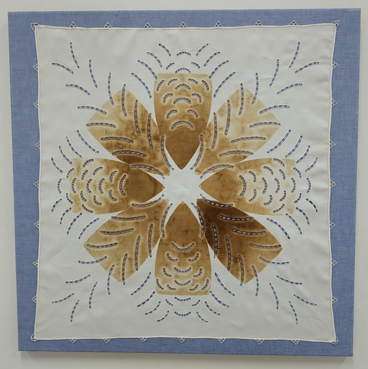Scorch: Mandala by Lesley Turner  Image: Lesley Turner, 'Scorch: Mandala', 2020, 28"x28". Vintage tea cloth, cotton fabric, polyester thread. A circular arrangement of elements helps focus attention on the task and provides a creative distraction.