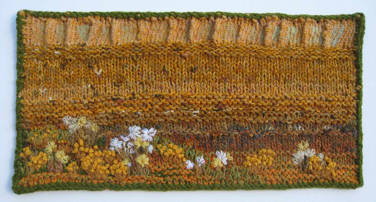 Roadside Weeds by Lesley Turner  Image: Lesley Turner, 'Roadside Weeds',  2011, 12"x24"x0.5", wool, cotton, silk, linen. The highly valued harvested commercial crop in the background contrasts with roadside weeds traditionally used as medicine, food, and in rituals.