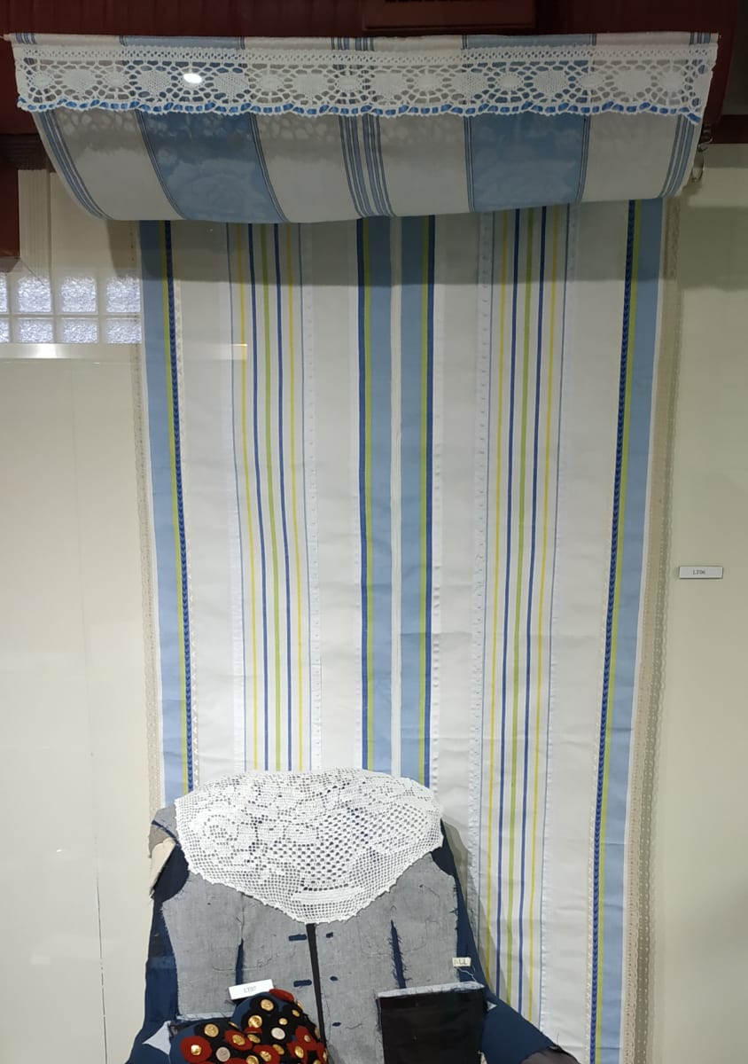 The Art of Concealment by Lesley Turner  Image: Lesley Turner, 'The Art of Concealment', 2018, 96"h x 45"w x 36"d. A canopy of tea towels, tea towel fabric and doilies. 