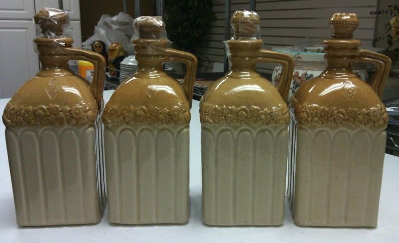 4 Spirit Bottles by Doulton 