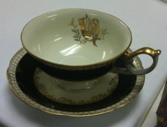 Cup and Saucer with Black and Gold Design by Del-Mar 