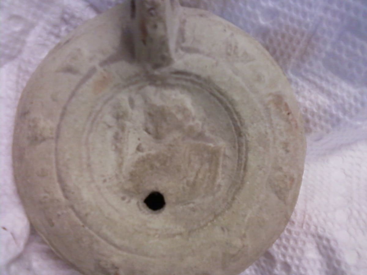 Roman Oil Lamp with Handle and Woman with Torch Relief by Unknown 