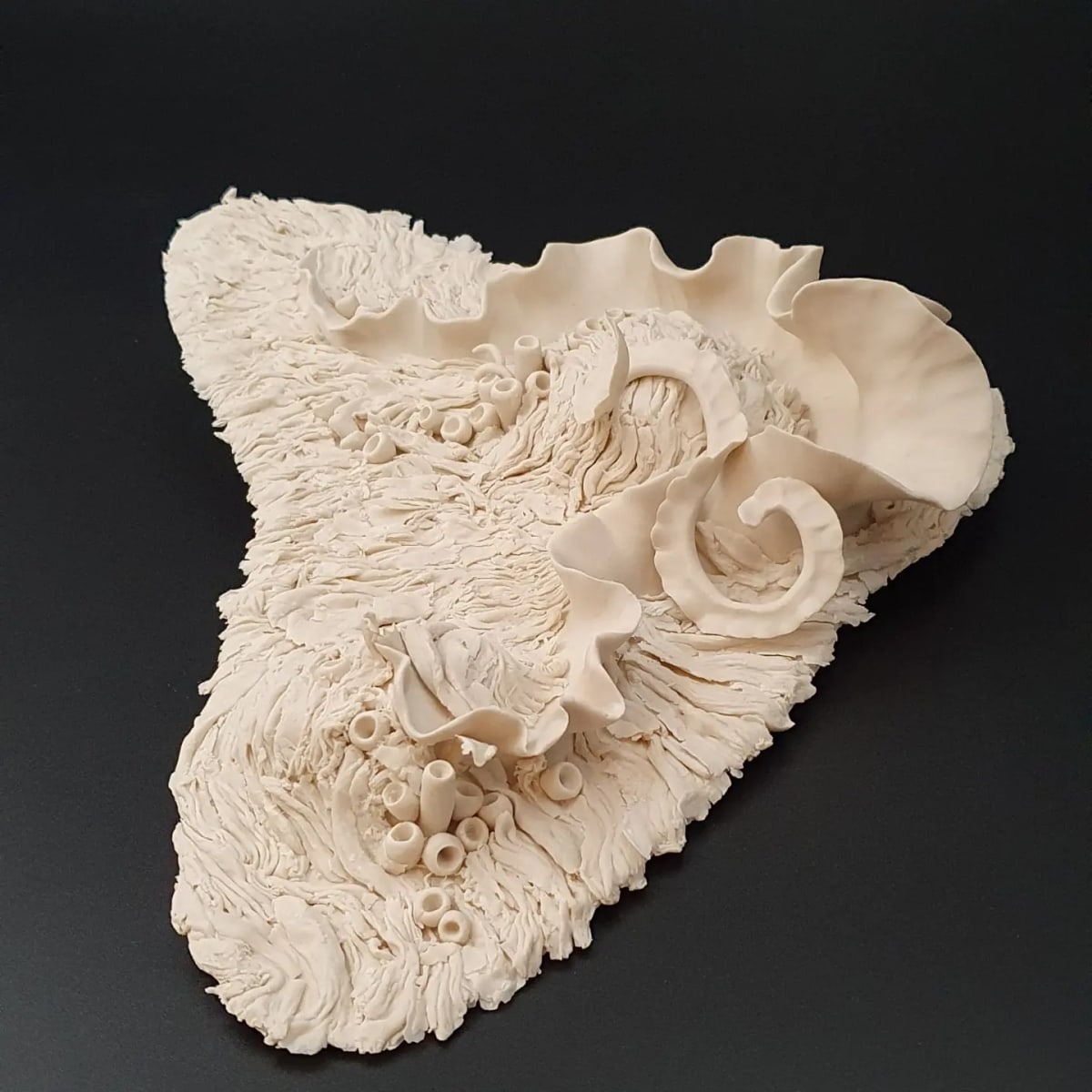 "No. 3," Seascape Series - porcelain wall sculpture by Sylvie Pool Alvarez  Image: No. 3 viewed from slightly below