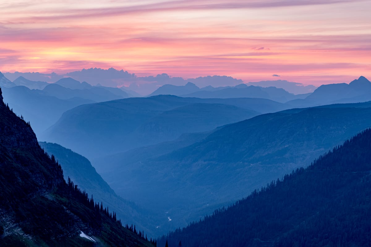 Glacier National Park, MT by Earl Todd  Image: The summer of 2021 brought smoke-filled skies to much of the west.  The only advantage to this smoke was the way it enhanced a sunset.  