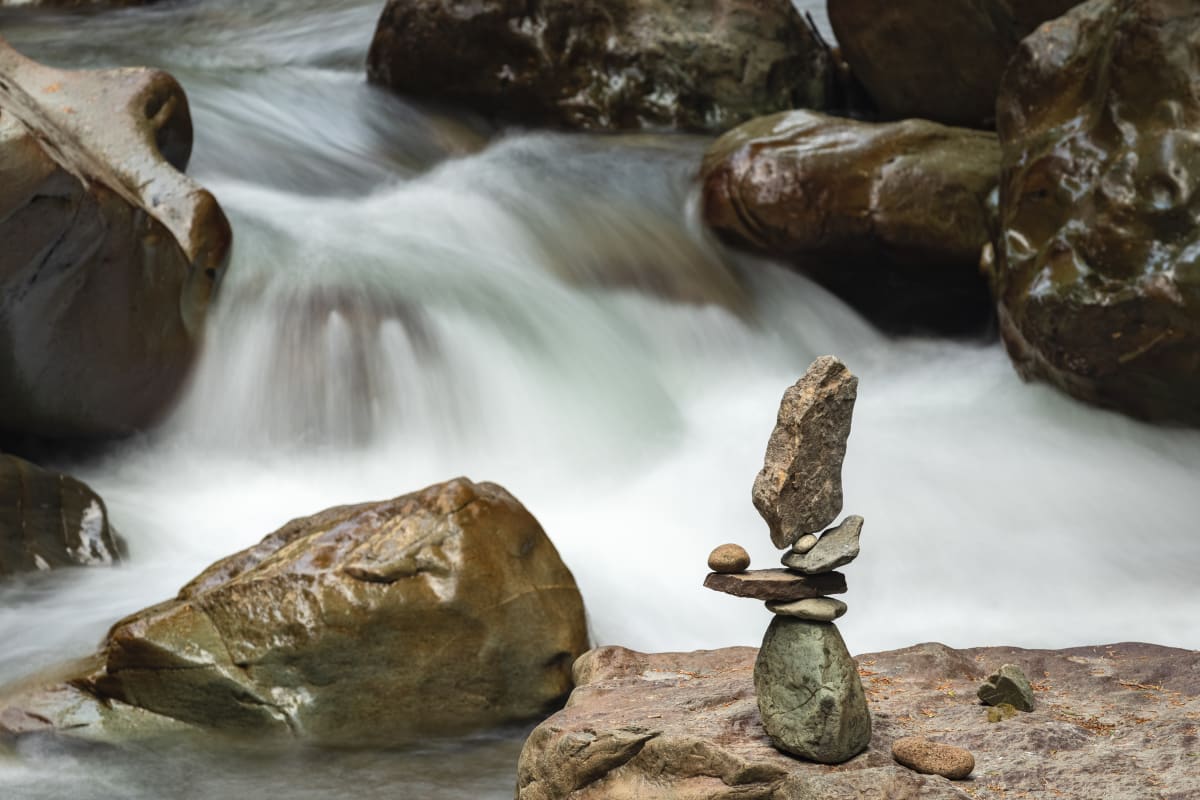 North Cascades National Park, WA by Earl Todd  Image: While hiking in North Cascades, we came across this stream just screaming to be photographed. As I walked around enjoying the area, I discovered this cairn that someone had scrambled out into the stream to build. To my eye, it 