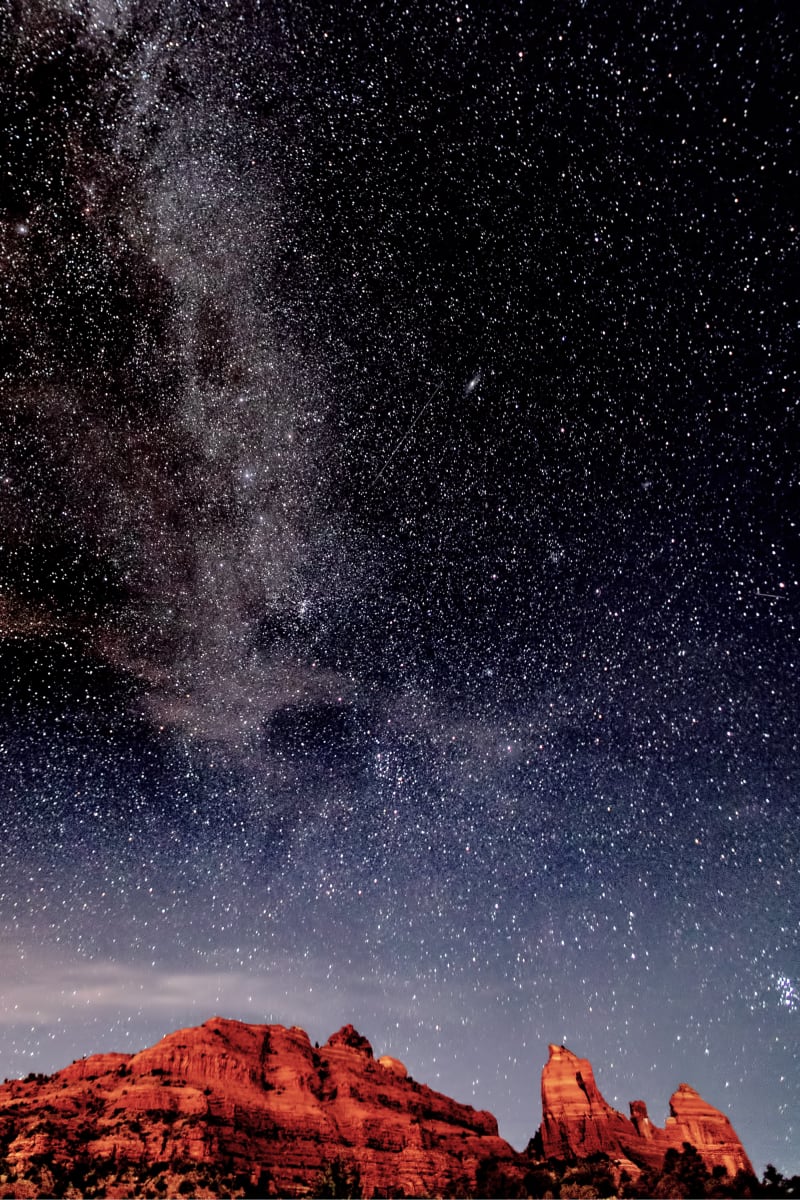 Milky Way over Snoopy Rock, Sedona, AZ by Earl Todd  Image: This is a single exposure of the Milky Way. In the lower right portion of the image, notice Snoopy lying on his back, stargazing and pondering the meaning of life.