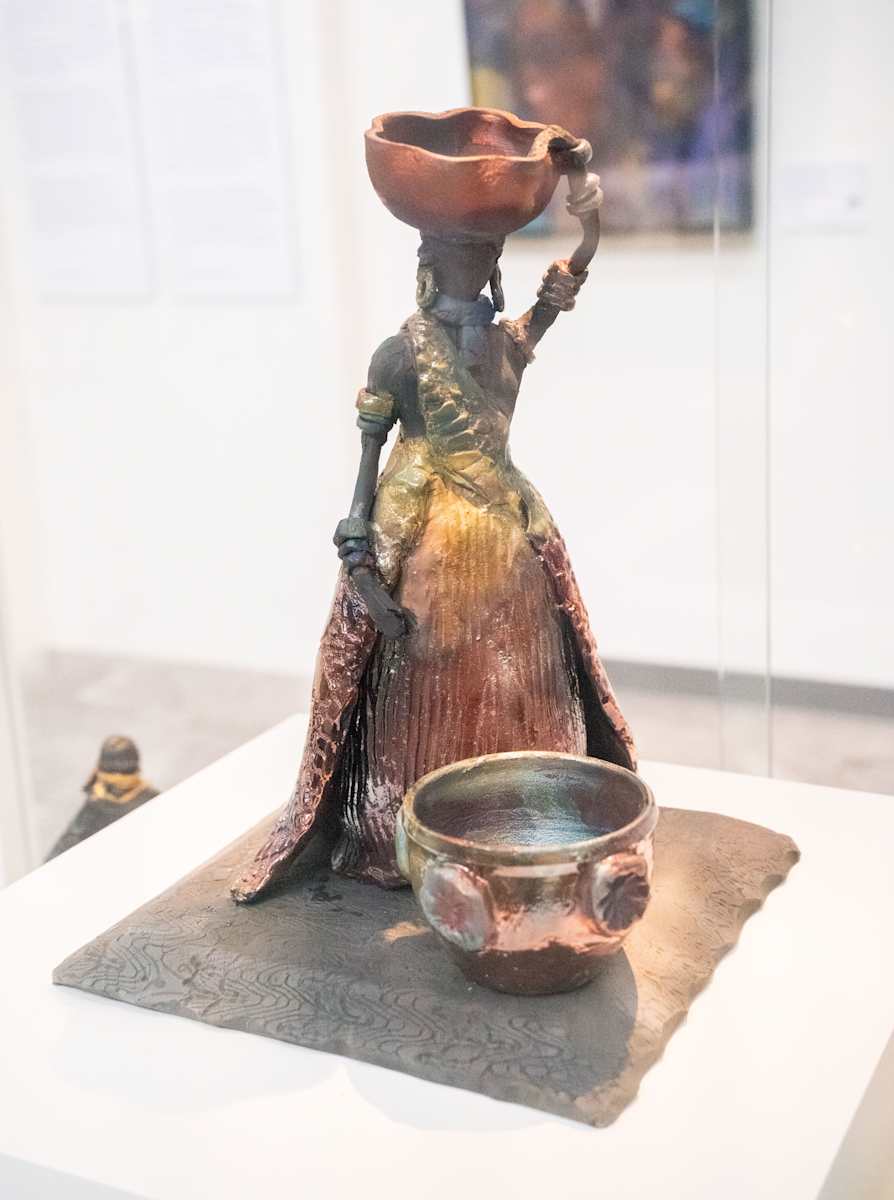 Woman with Basket by Yvonne Stubbs 