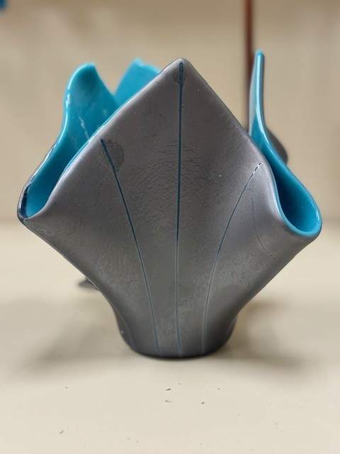 Blue on Steel by Jay Laxton  Image: Steel blue glass with Turquoise stringers
