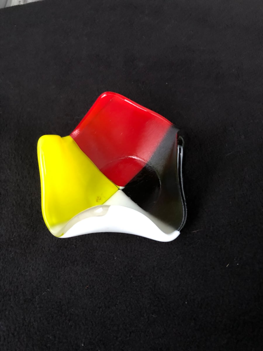 4 corners candle holder by Jay Laxton 