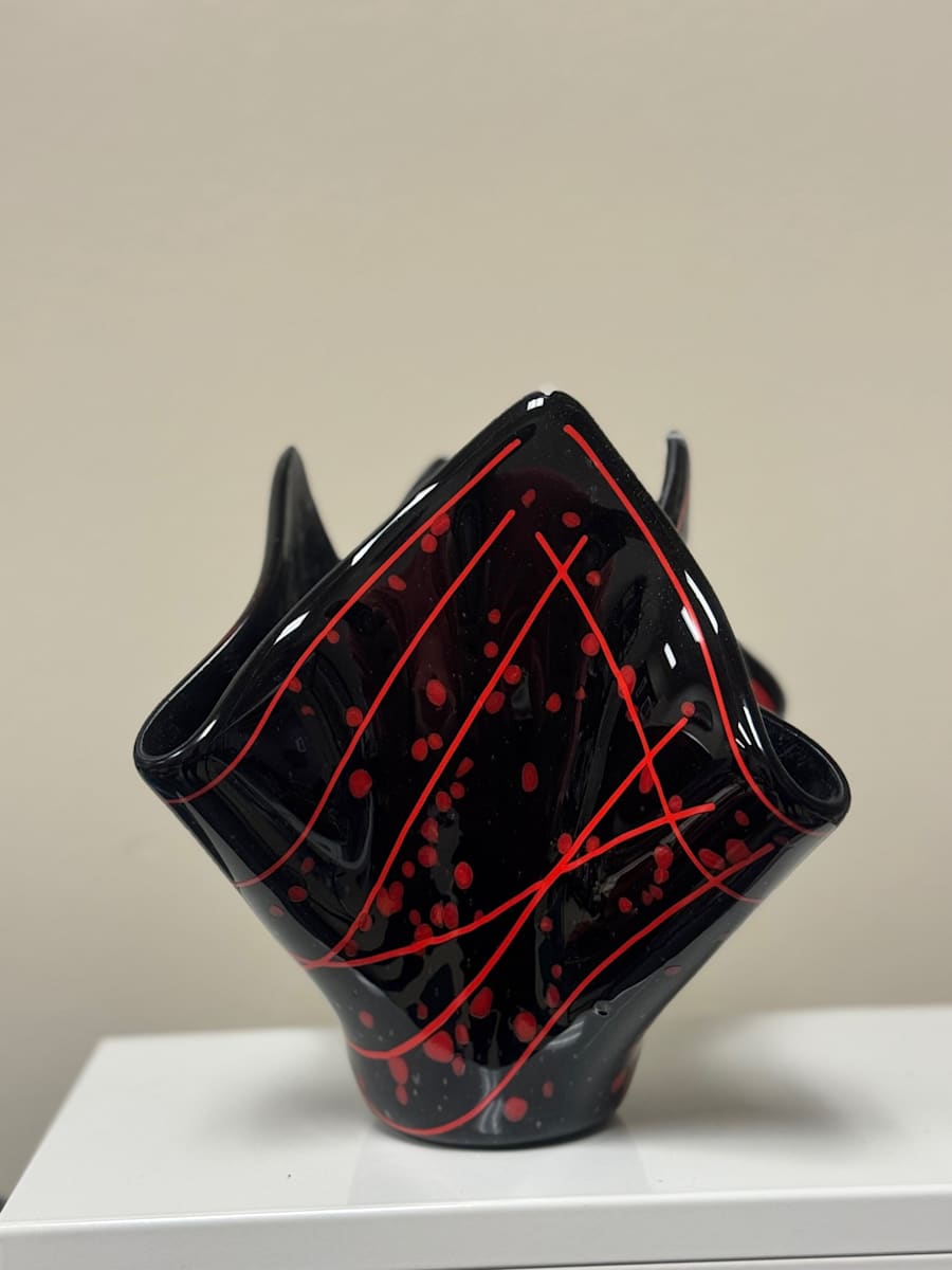 Fire Embers by Jay Laxton  Image: Black Glass fused with red frit and stringers to resemble the embers coming off a campfire