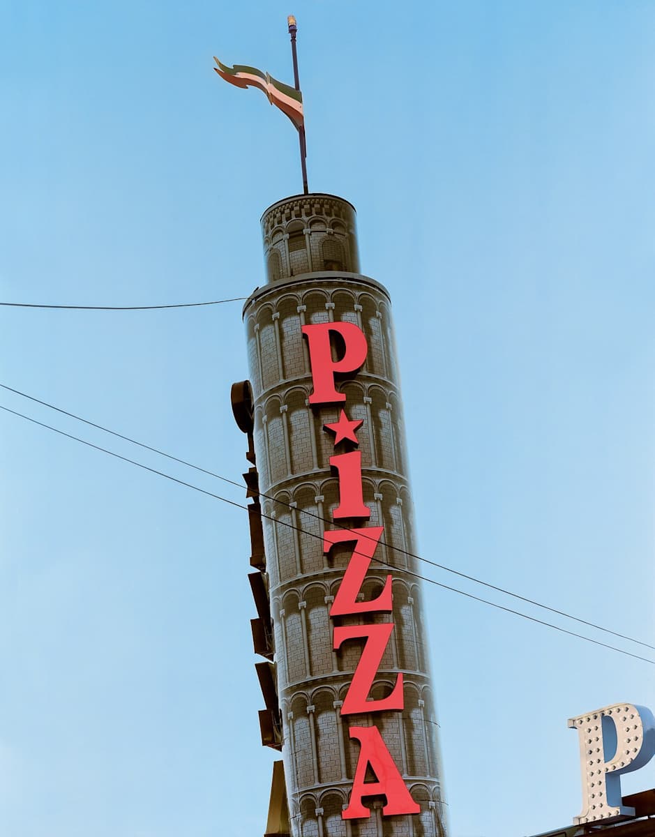 Sign at Prince's "Leaning Tower of Pizza." US 1, Saugus, MA 2022 by Jim Dow 