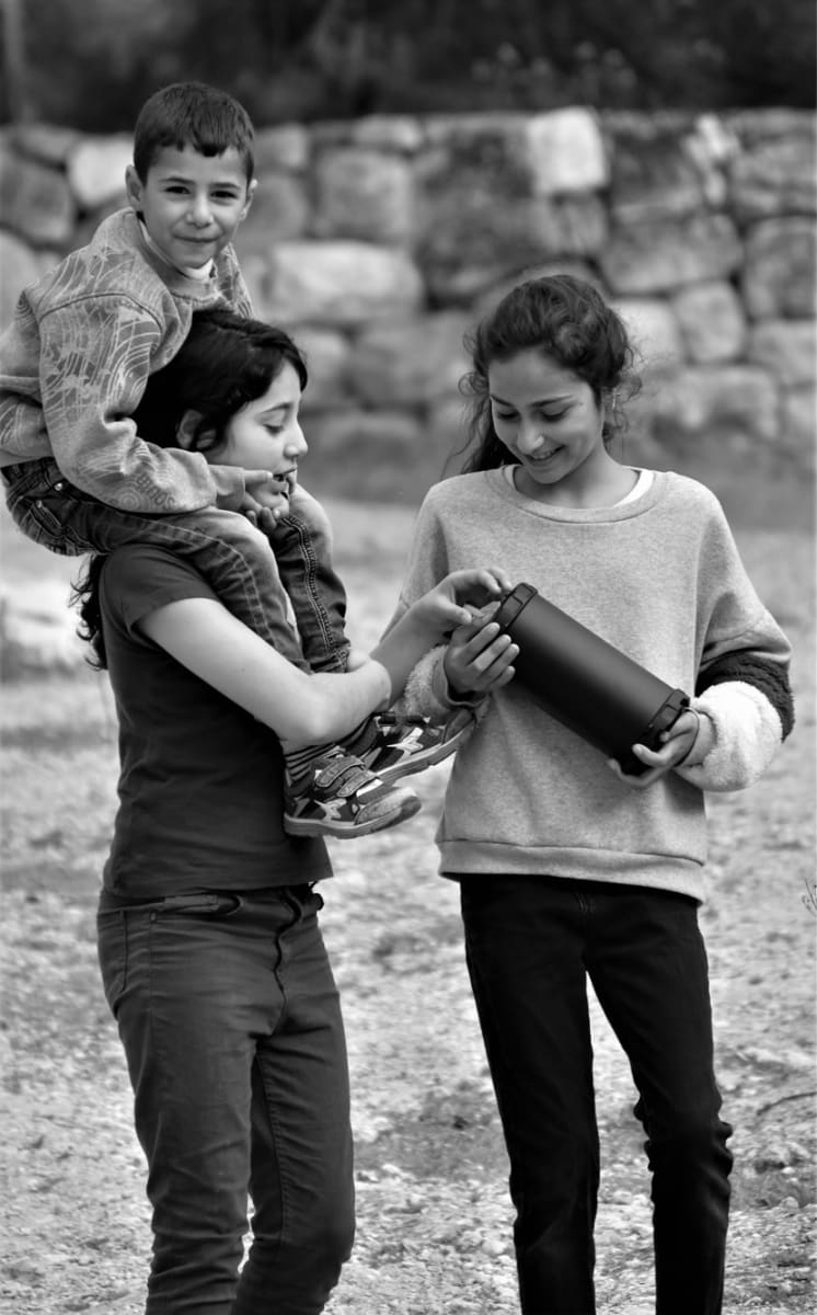 On Sisters Shoulders by Anat Ambar 