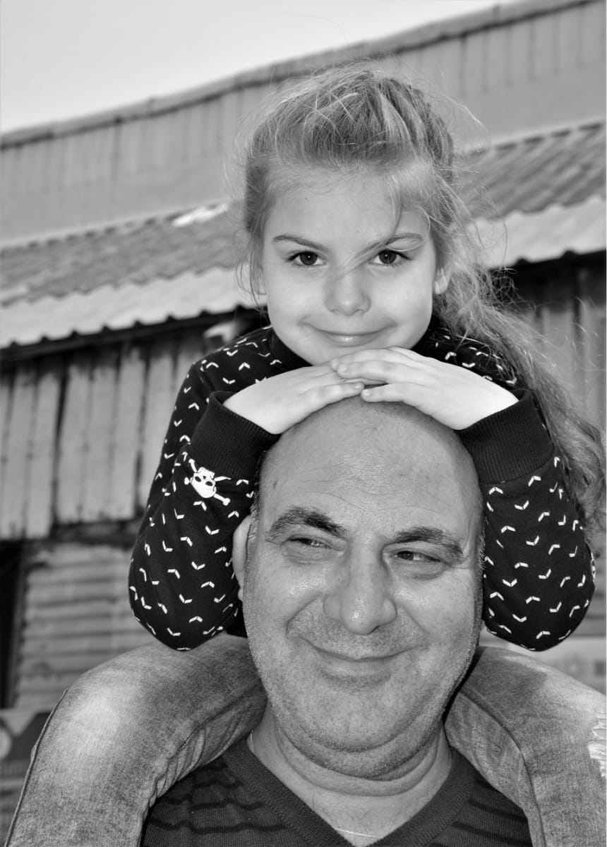 On Dad's Shoulders by Anat Ambar 