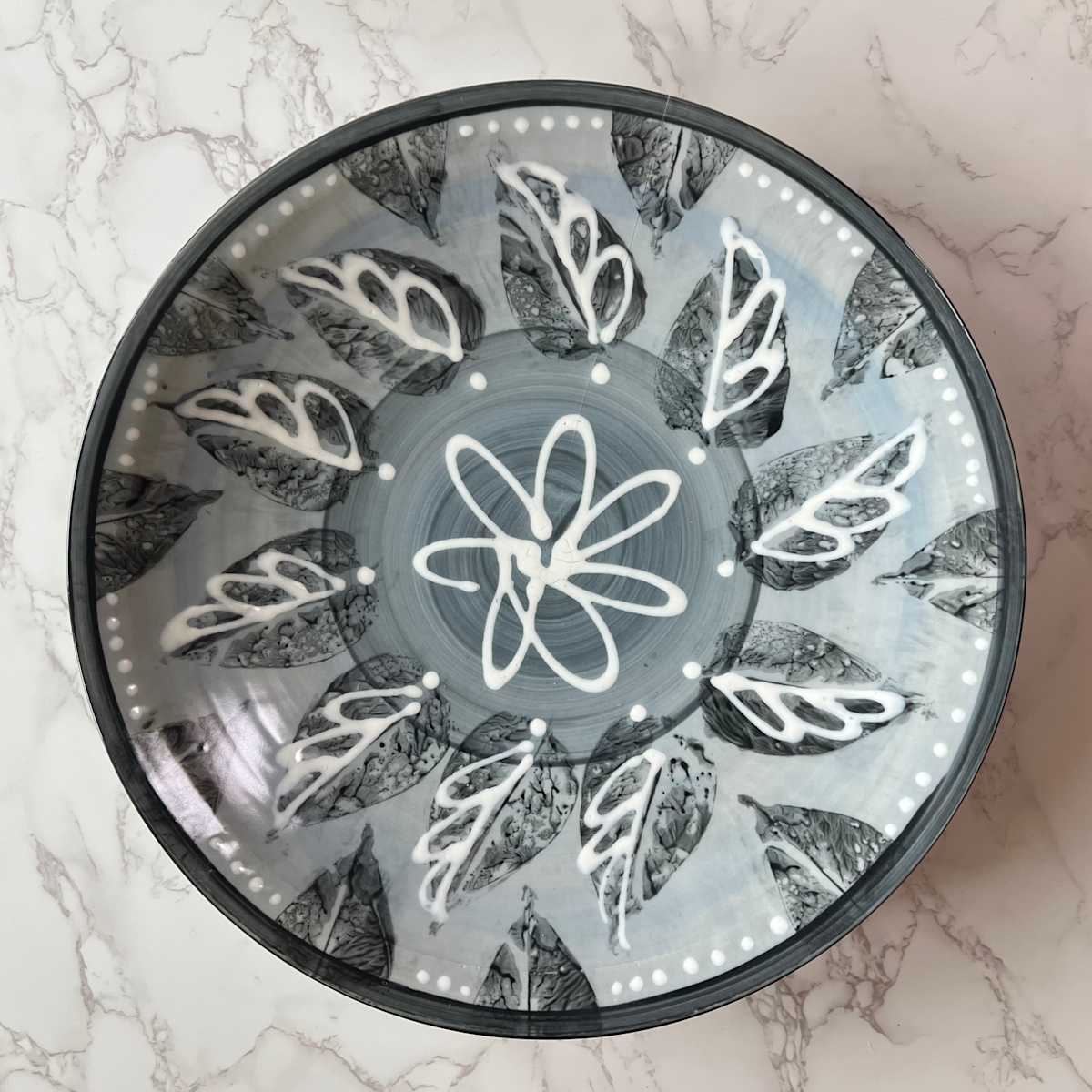 Low/wide bowl in Arctic Blue with leaves and swirls by Kristin Bernhardt Conrad 