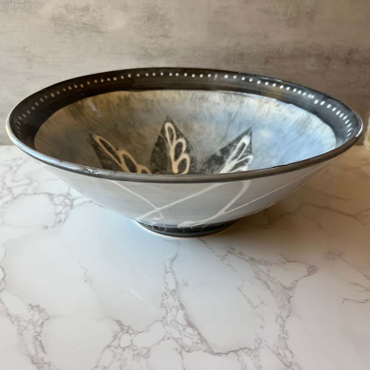 Bowl with leaf and swirls design in Arctic Blue by Kristin Bernhardt Conrad 