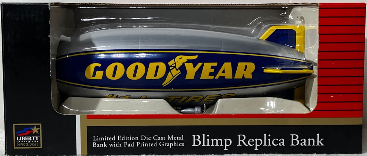 Goodyear Blimp Replica Bank  Image: Liberty Classics Replica Bank of Goodyear Blimp made by SpecCast.  Limited Edition Die Cast Metal Bank (Model No. 36006). "#1 in Tires" pad printed graphics below brand name.. 