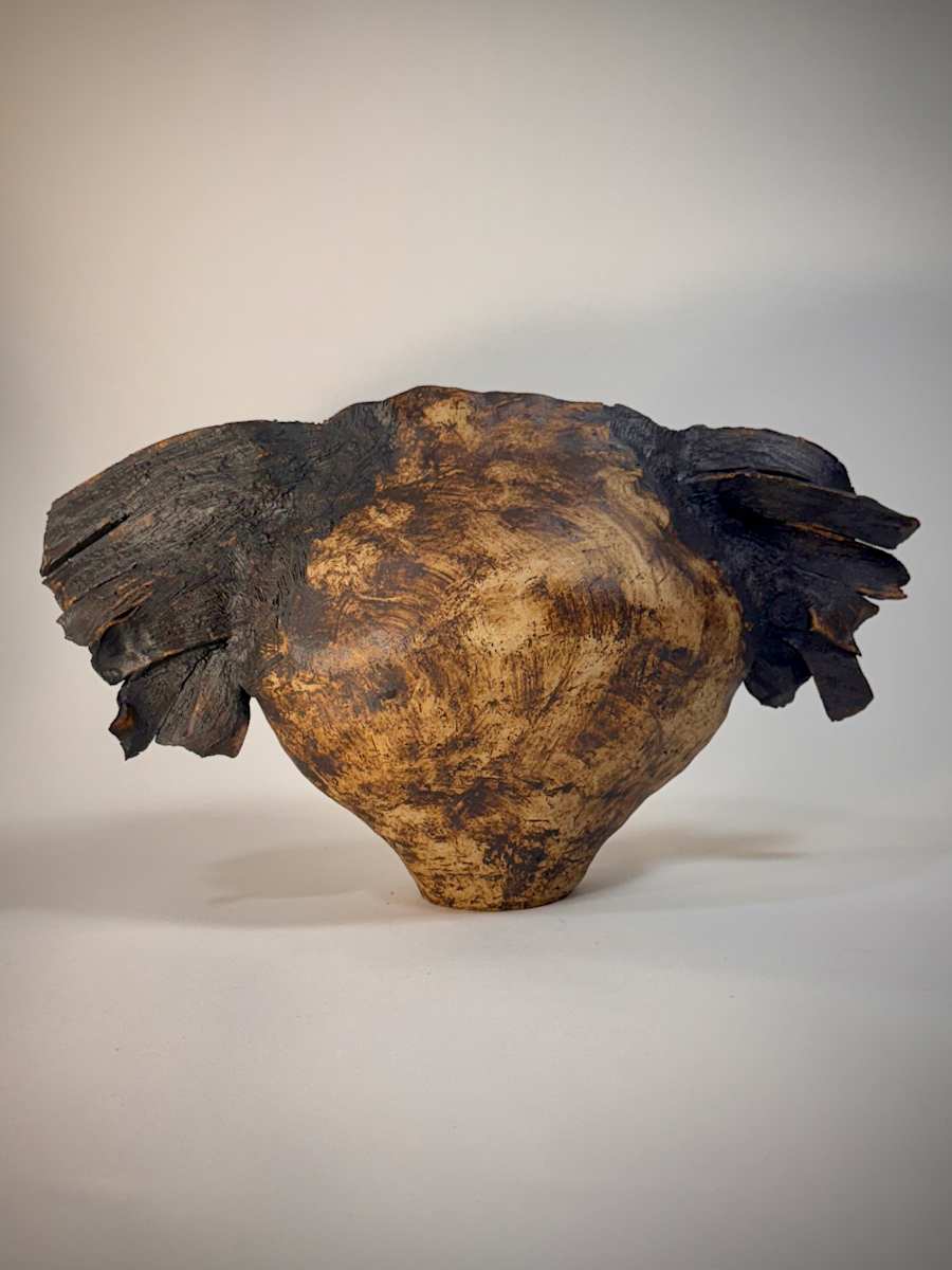 Daedalus by Jennifer K Brown  Image: Daedalus built wings of feathers and beeswax to enable him and his son Icarus to escape Crete. Icarus flew too close to the sun, with tragic consequences. 