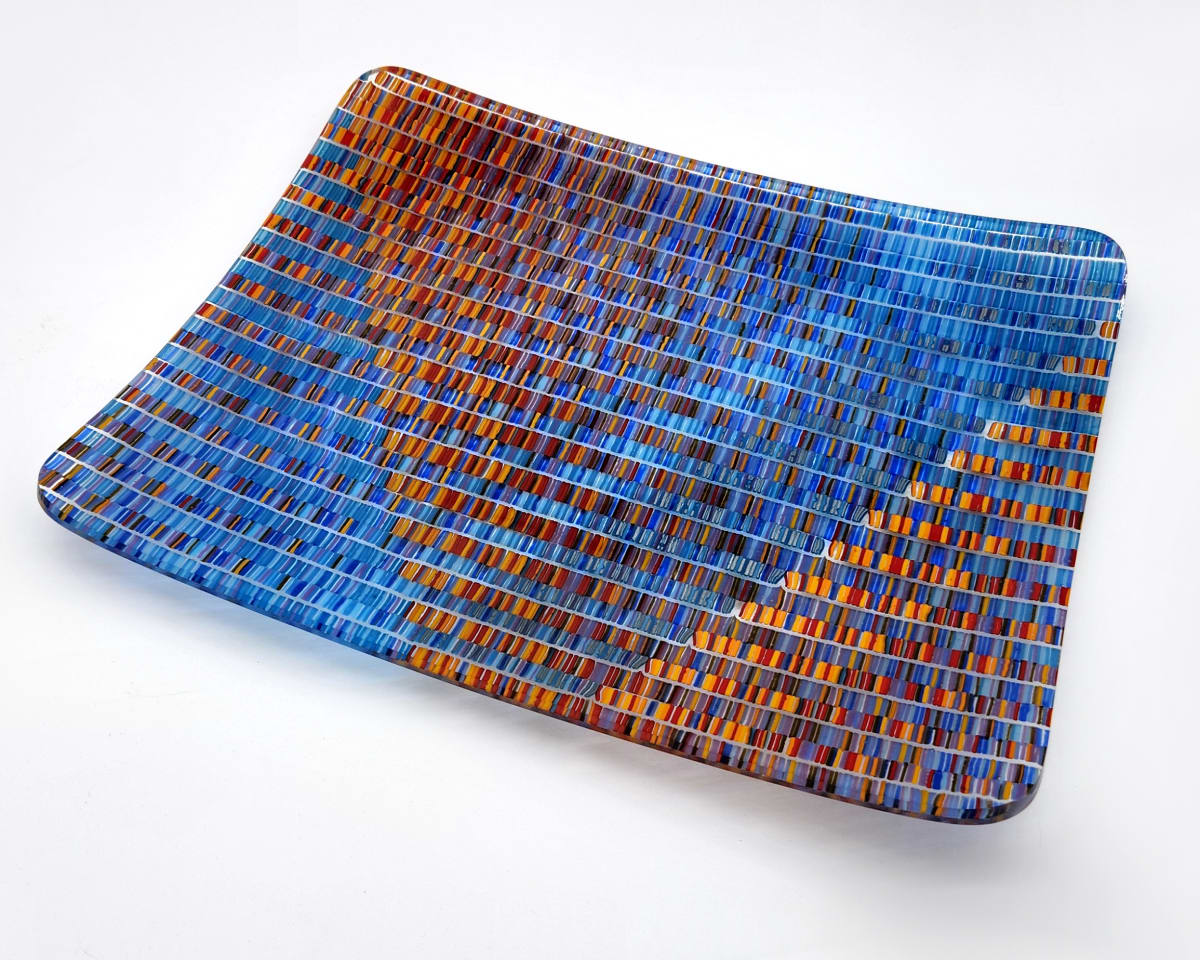 Hot Blue Steel by Michael "Miguel" Sanchez  Image: The red and blue color of a hot a flame come together to accent the silver tone glass strands in this piece.  