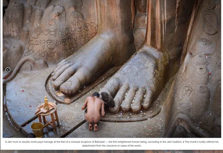 A Jain Ascetic Pays Homage to a Colossal Statue of Bahubali by Shravanabelagola, Karnataka 