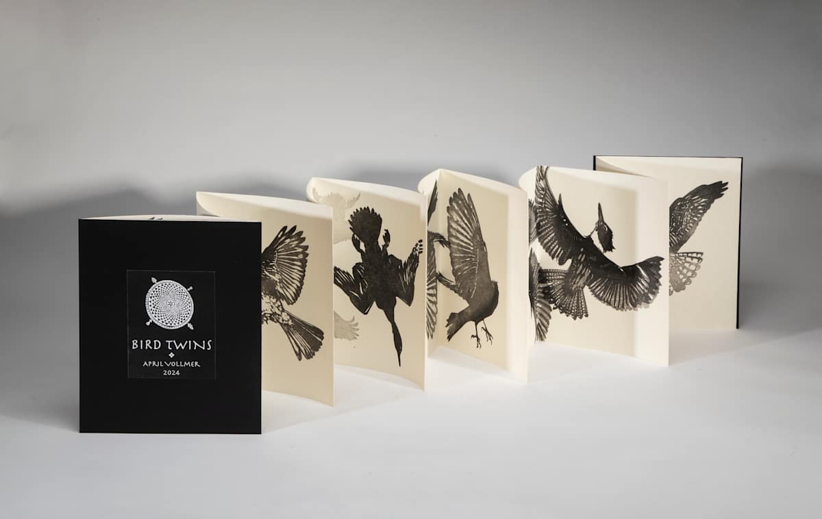 Bird Twins Book (ed 6) by April Vollmer  Image: a six page leporello book of mokuhanga bird woodcuts on Echizen washi with black mat board covers, edition 6