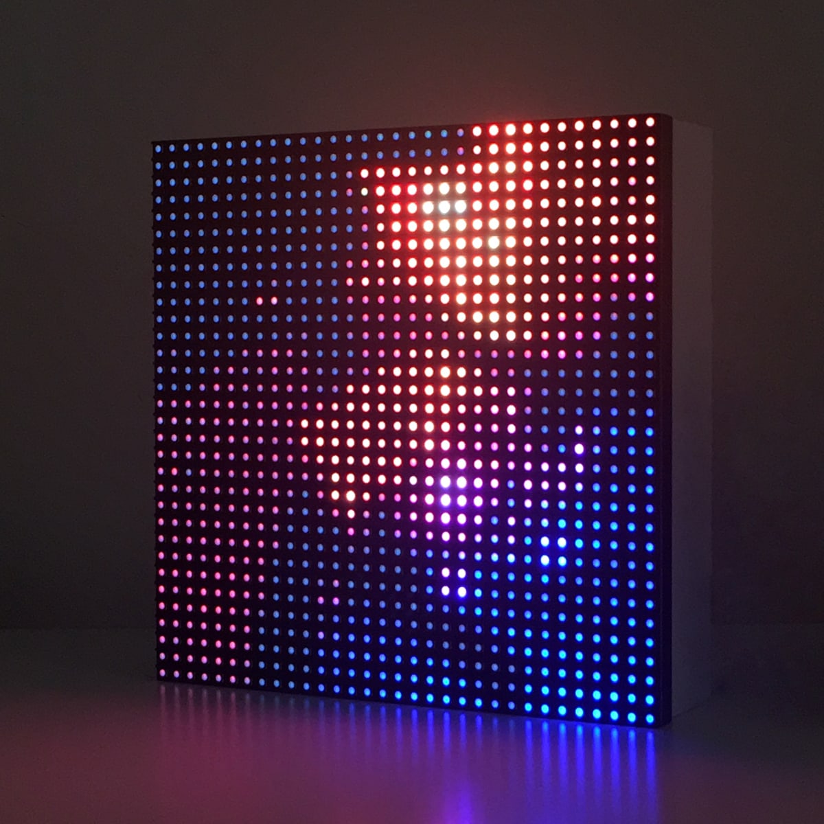 The New Normal by James Clar  Image: LED matrix object 32x32 pixels (pictured: yellow/blue edition)