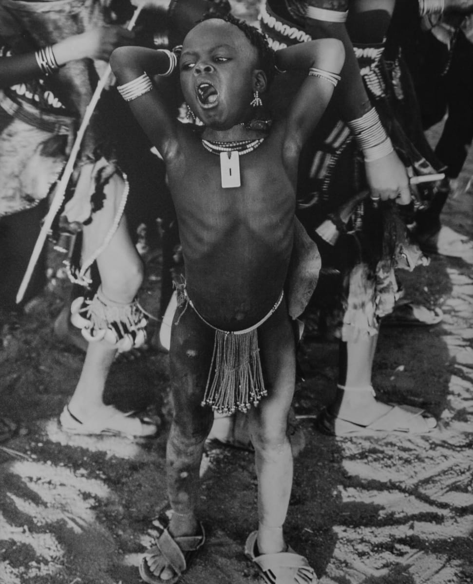 Yawn, Omo Valley, Ethiopia​ by Mark Lakin 