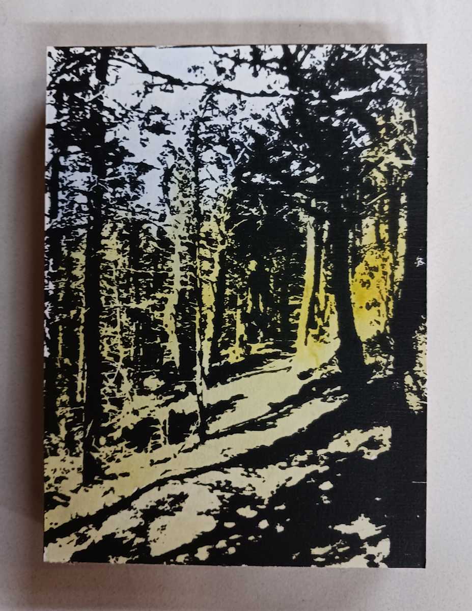into the woods on wood by dennis gordon 
