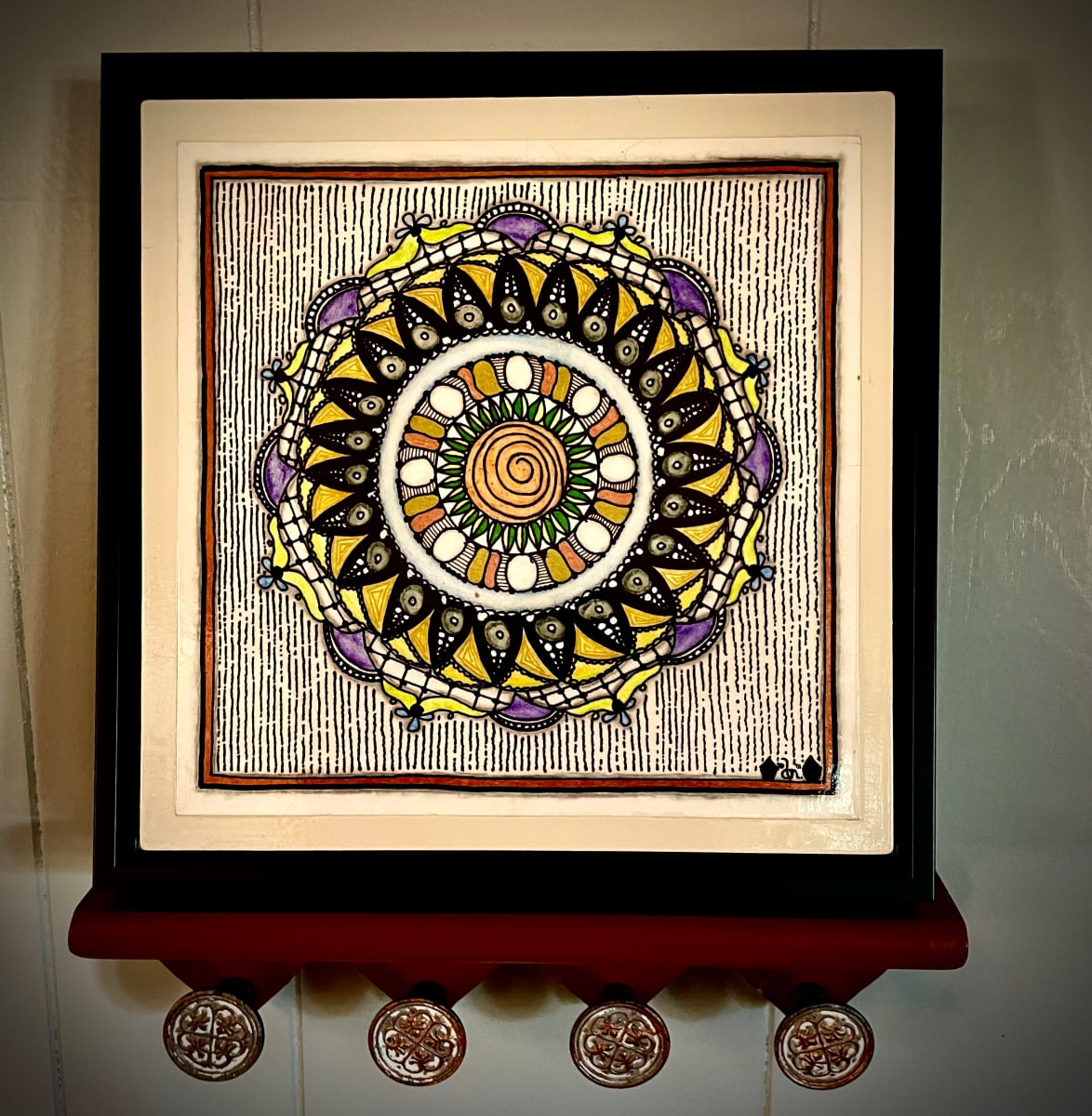 “Expanding Floral Mandala” by Donna Norton  Image: Paper on wood panel in floating frame