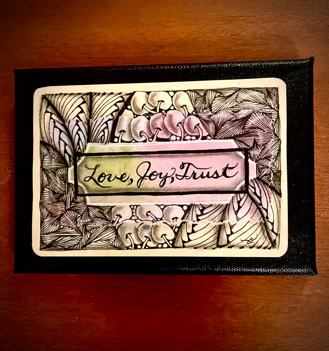 Love, Joy, Trust by Donna Norton  Image: Live, Joy, Trust is on canvas. 