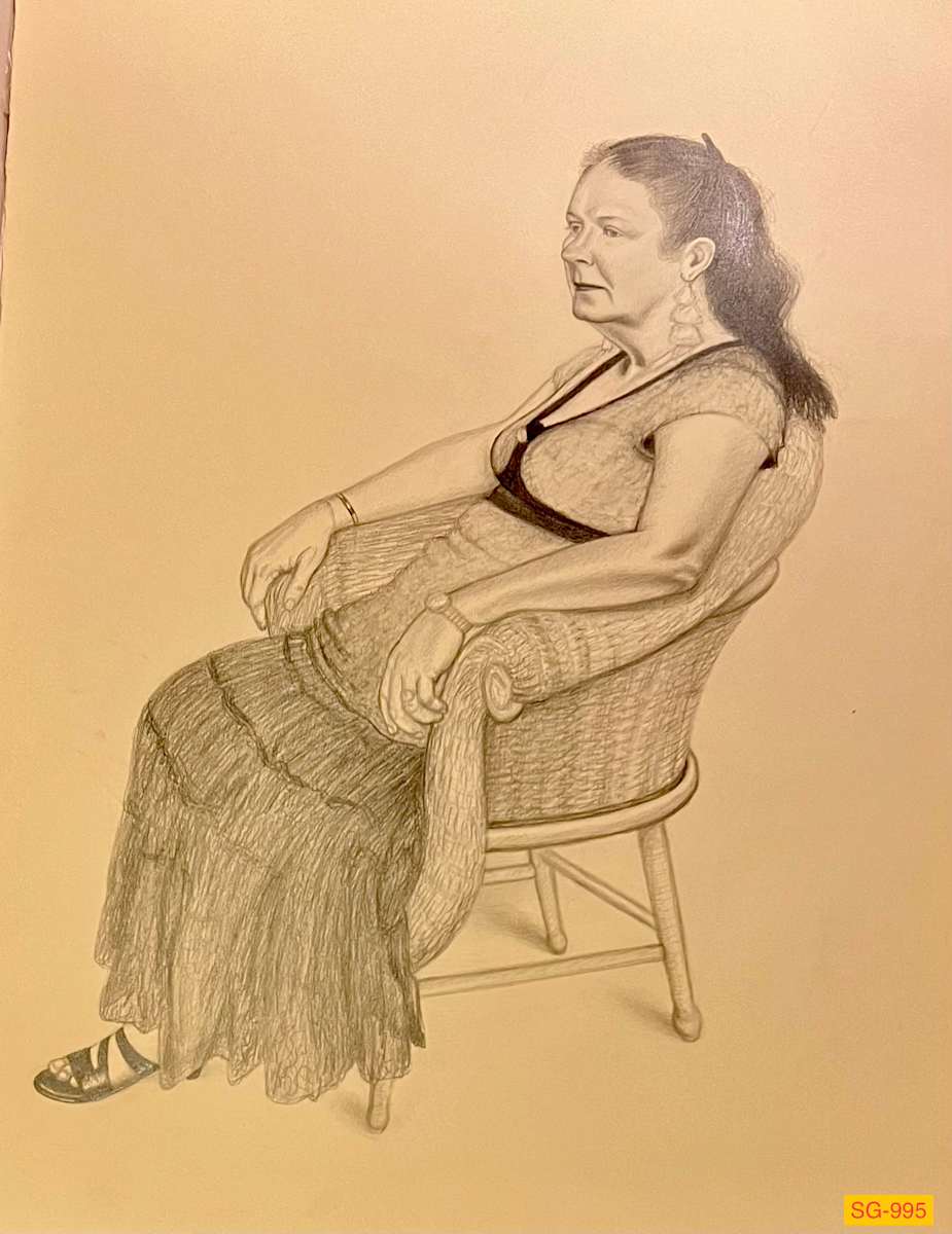Untitled (female model fully clothed, seated in a wicker chair) by Spence Guerin 